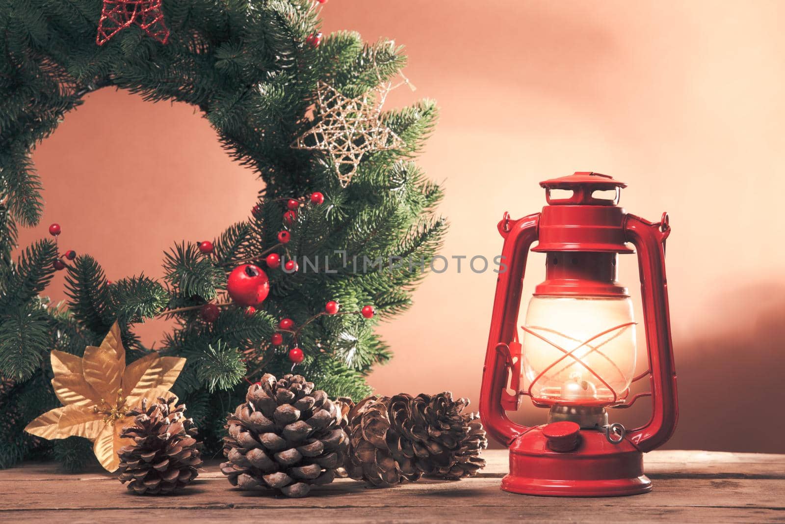 Cerosene lamp and Christmas wreath, decorations for holiday