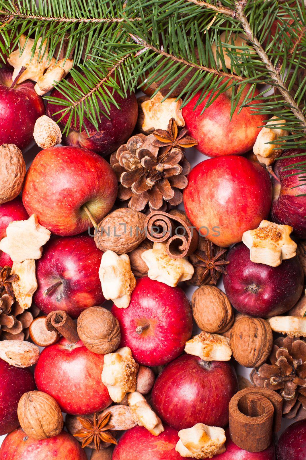 Apples, cones, nuts and cookies with spices. Aroma Christmas