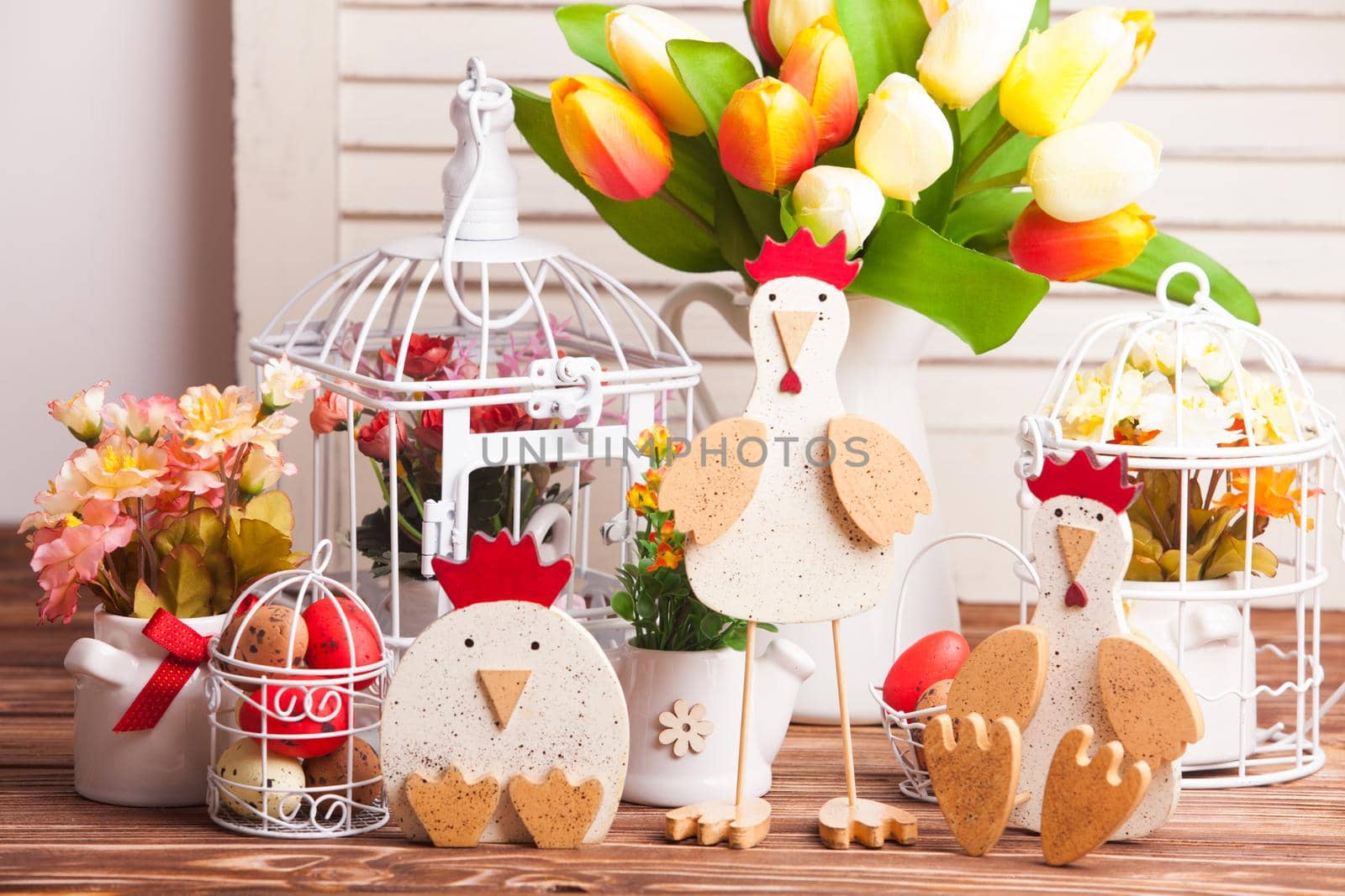 Wooden chickens figures - Easter decorations on the table