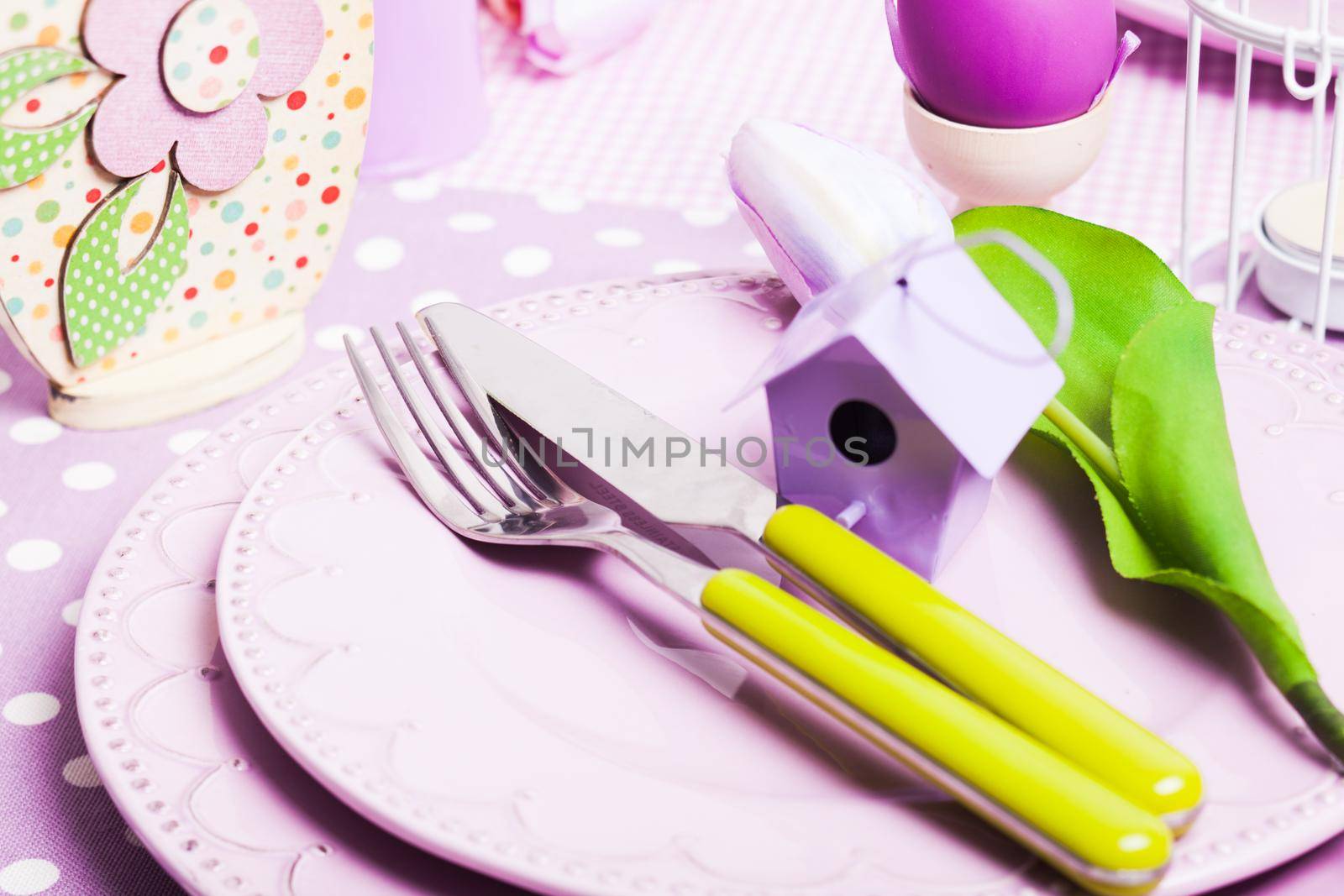 Easter serving, lilac plates and green flatware and decor