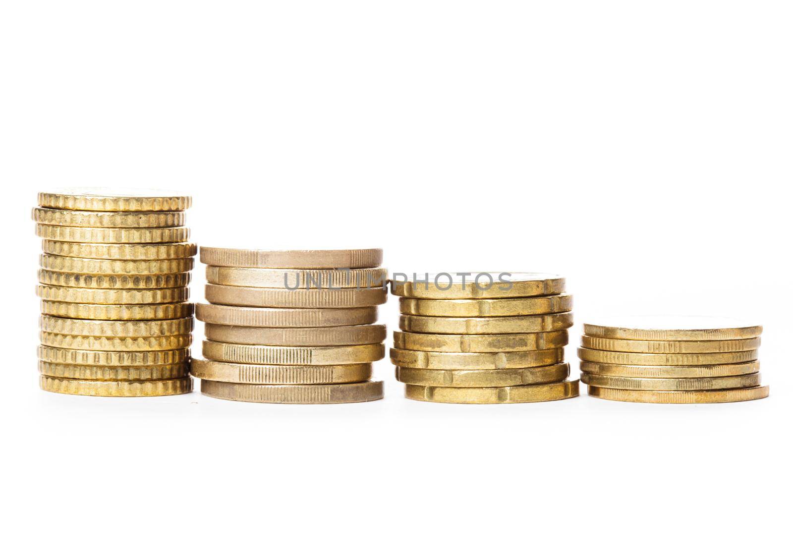 The tower of golden coins isolated on white