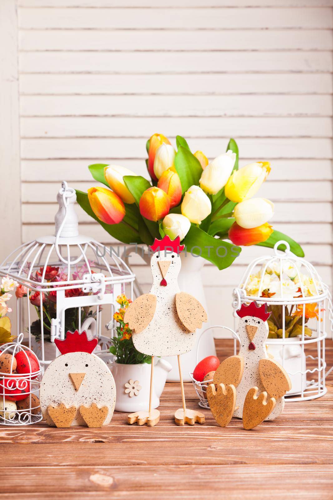 Wooden chickens figures - Easter decorations on the table