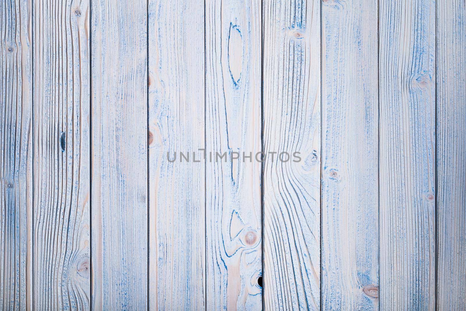 Blue wooden wall, painted in shabby chic style