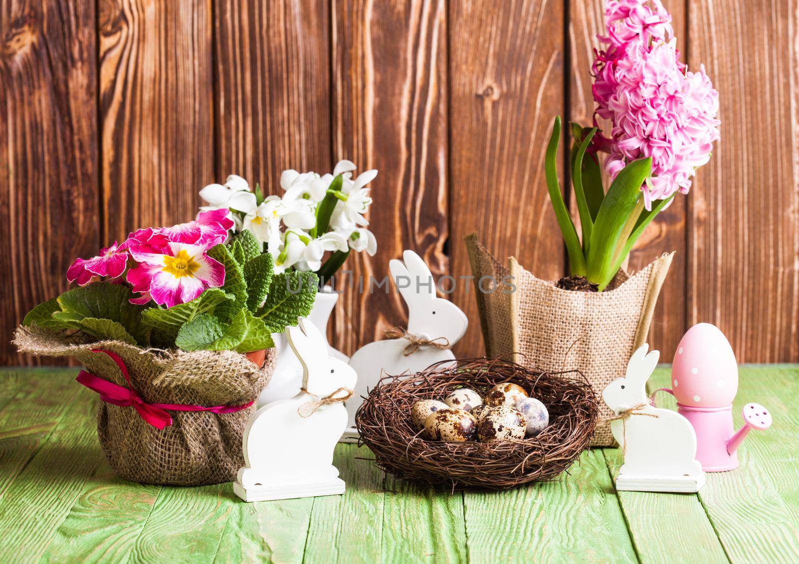 Easter decorations - white shabby chic bunnies and spring flowers