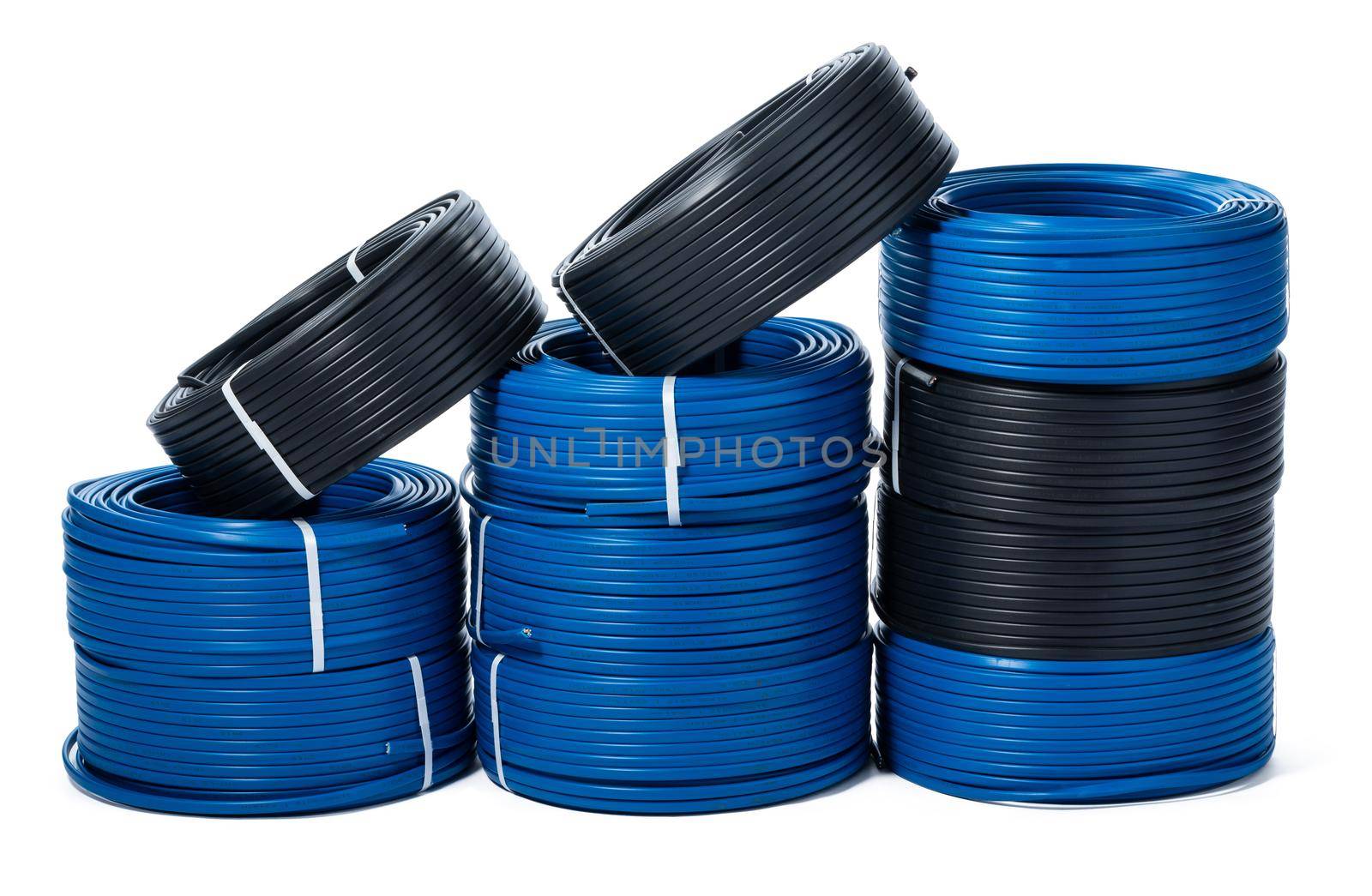 Coils of black and blue cable isolated on white background. Close up.