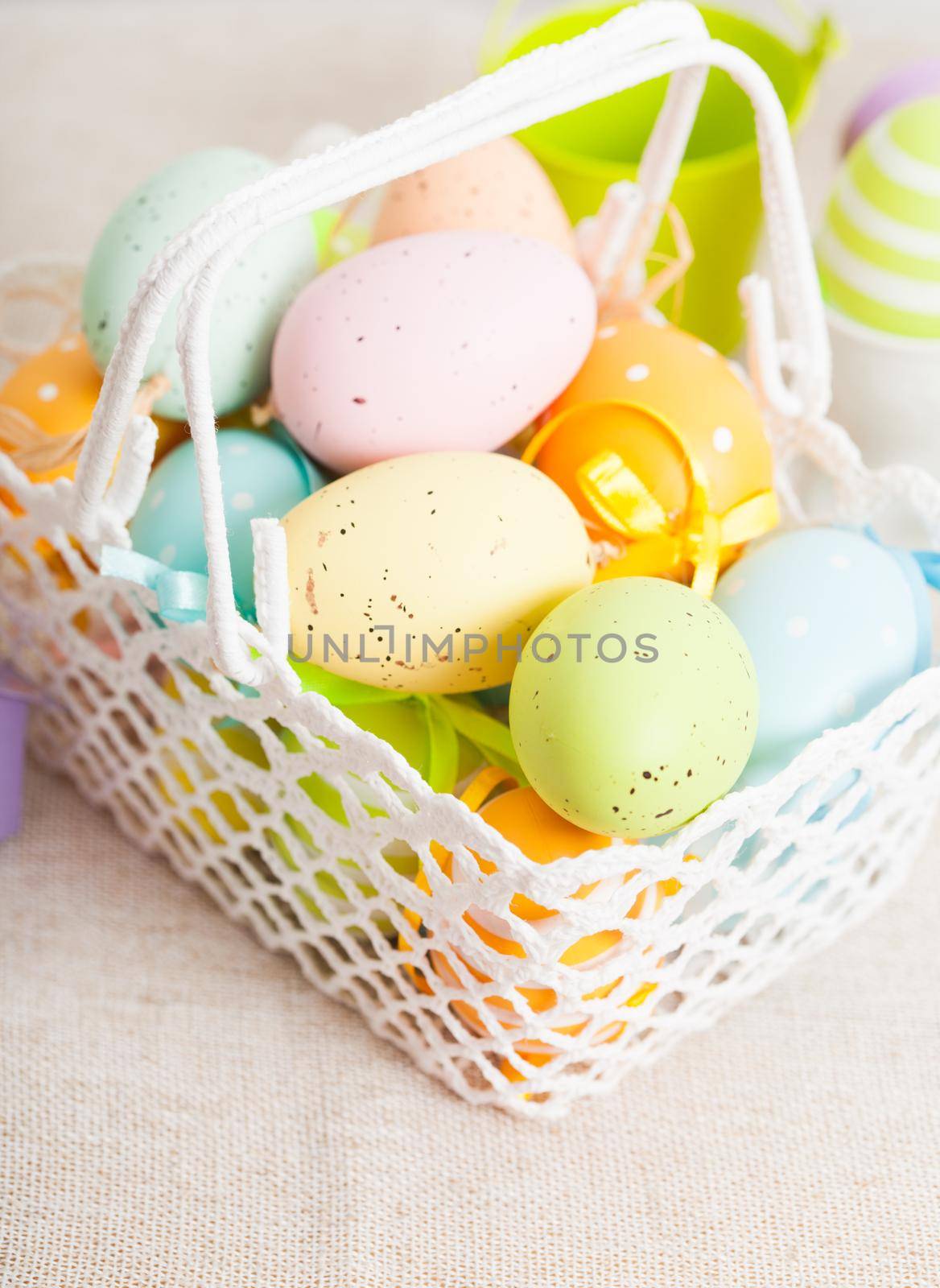 Easter eggs in the white crochet basket