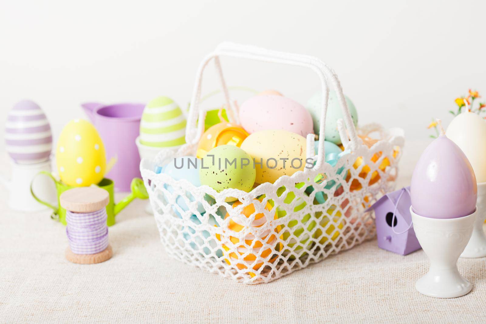 Easter eggs in the white crochet basket