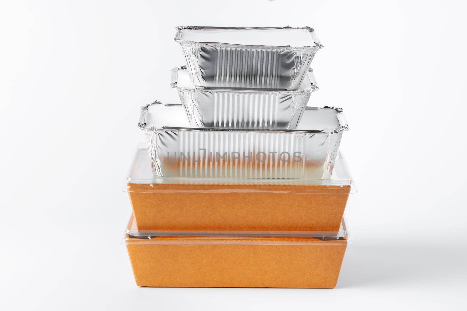 Assortment of food delivery containers on white background close up