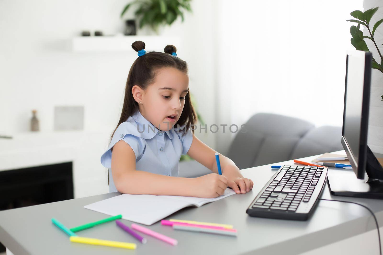 Little Girl Using Computer Concept, distance online learning