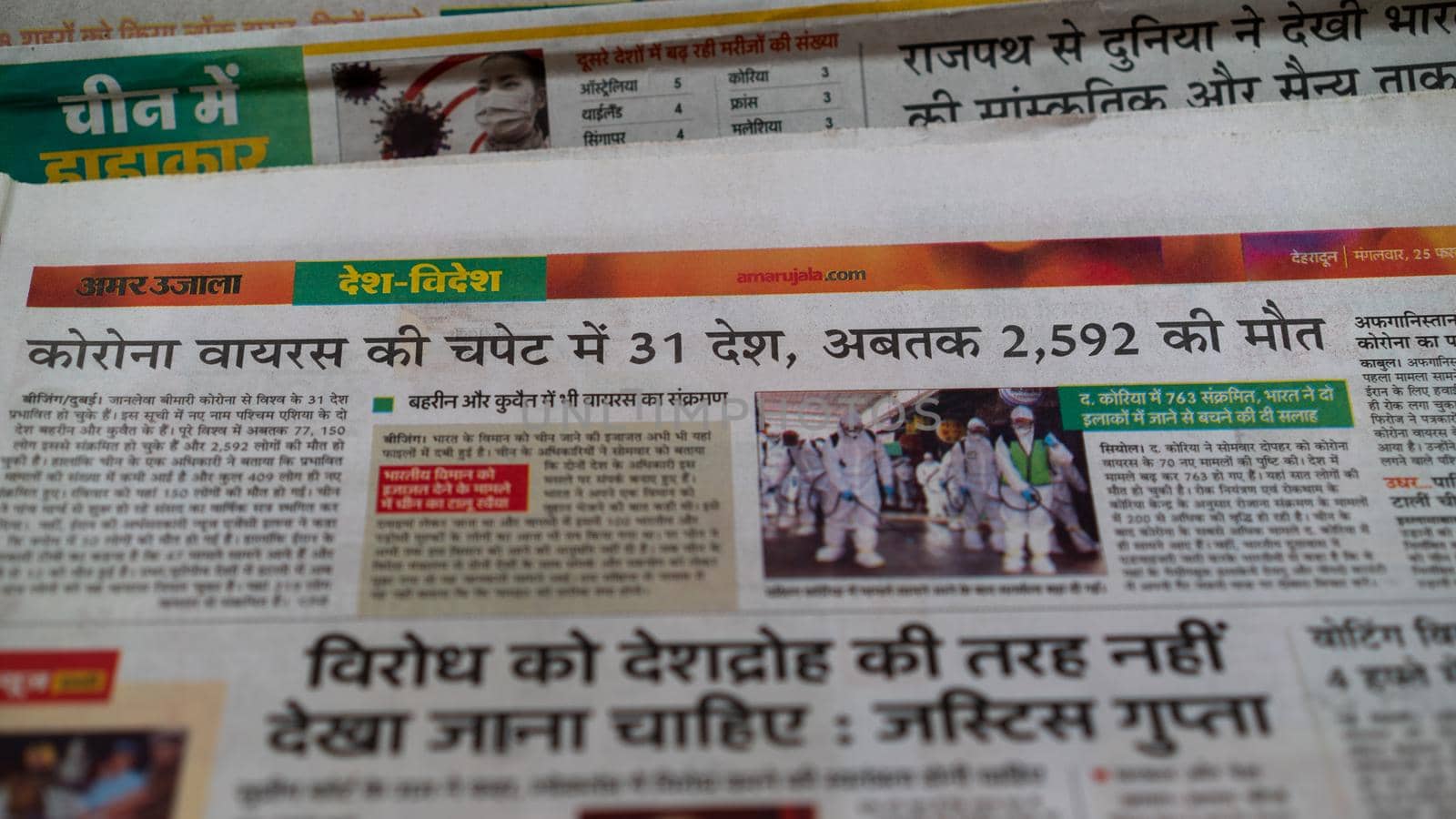 Dehradun, Uttarakhand India June 28, 2021. Hindi, Coronavirus COVID-19 News Headline in Newspaper of India. Headlines of the month March, April 2020.