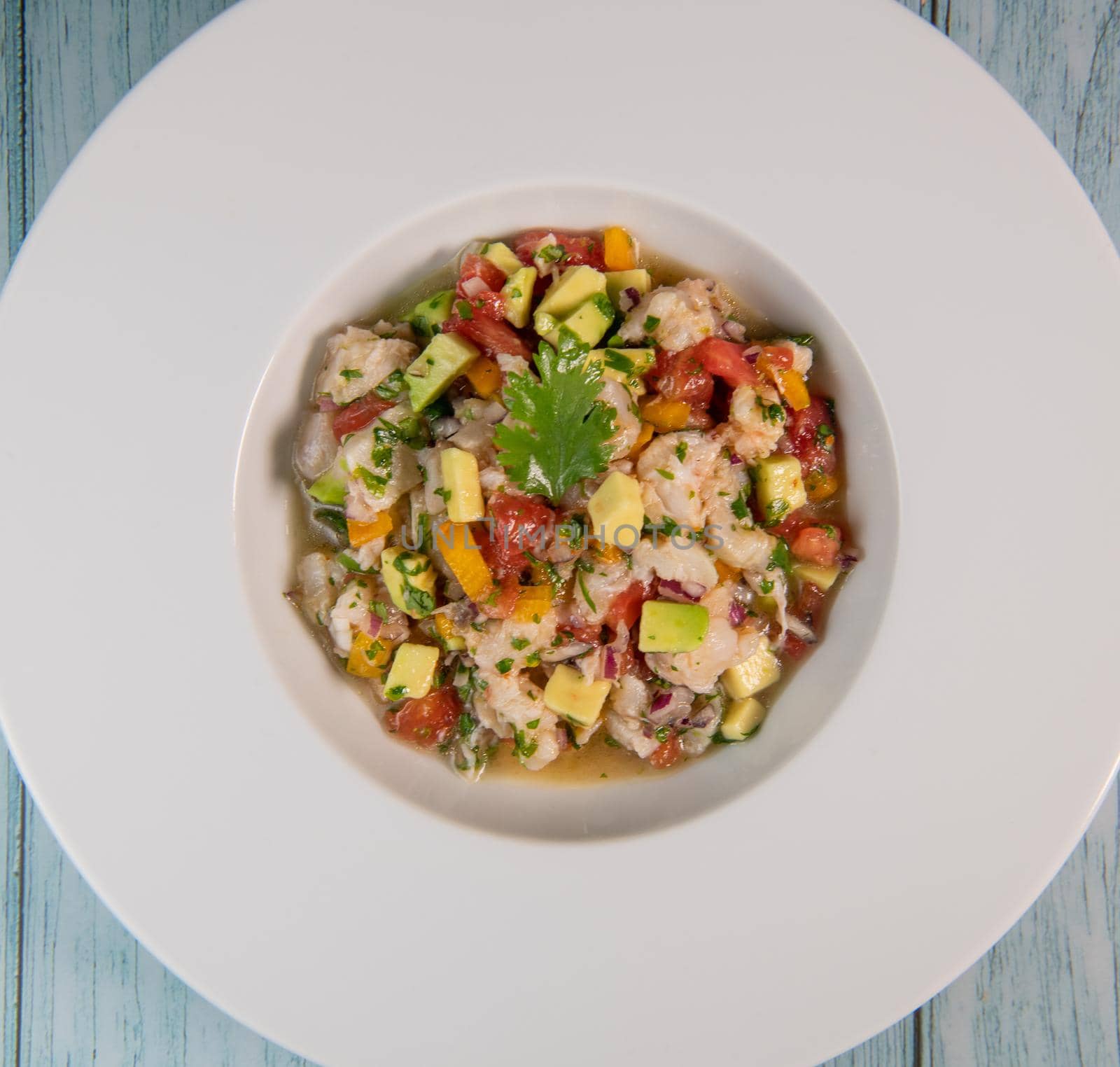 Cod Ceviche recipe, bread in oil and garlic. High quality photo