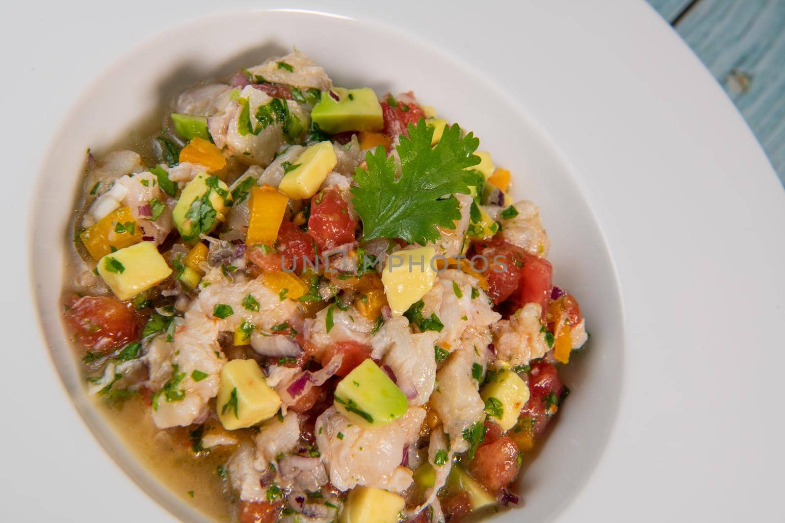 Cod Ceviche recipe, bread in oil and garlic. High quality photo