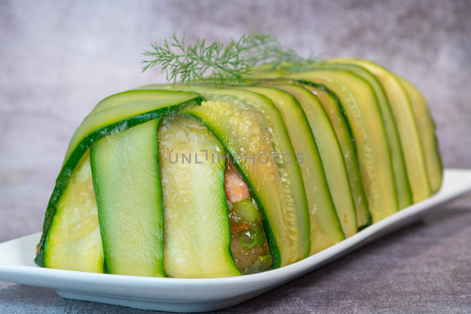 Recipe of marbled vegetables, salmon and langoustines, terrine salmon vegetables and langoustines. High quality photo