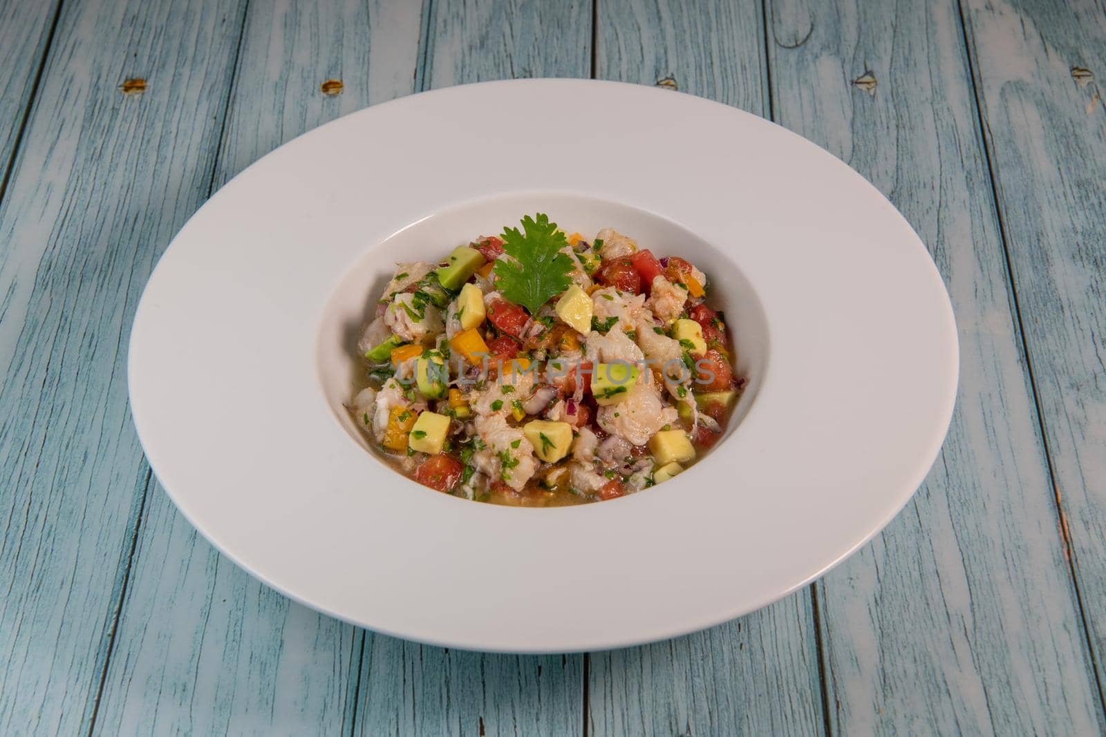 Cod Ceviche recipe, bread in oil and garlic. High quality photo