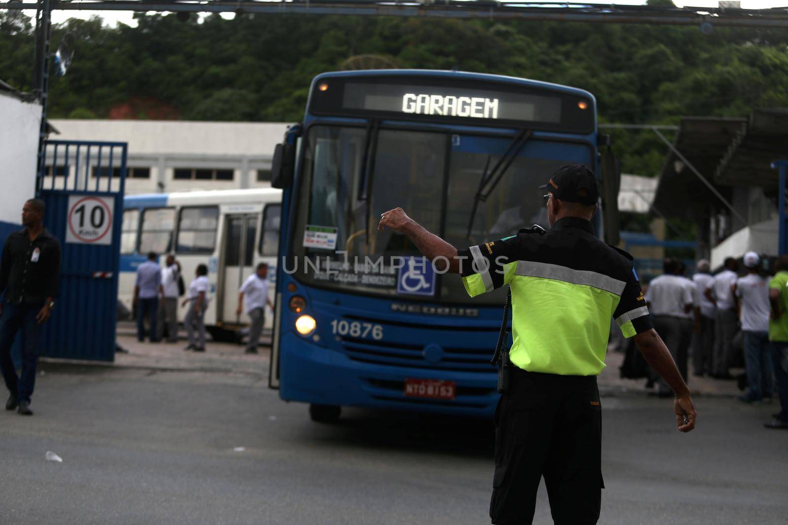 salvador, bahia, brazil - april 4, 2019: Bus driver are seen in during gravel movement in a company garage in the city of Salvador.