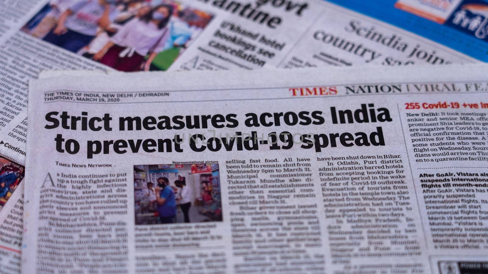 Dehradun, Uttarakhand India June 28, 2021. Coronavirus COVID-19 News Headline in Newspaper of India. Headlines of the month March, April 2020. High-quality apple prores 422 4k footage 60p.