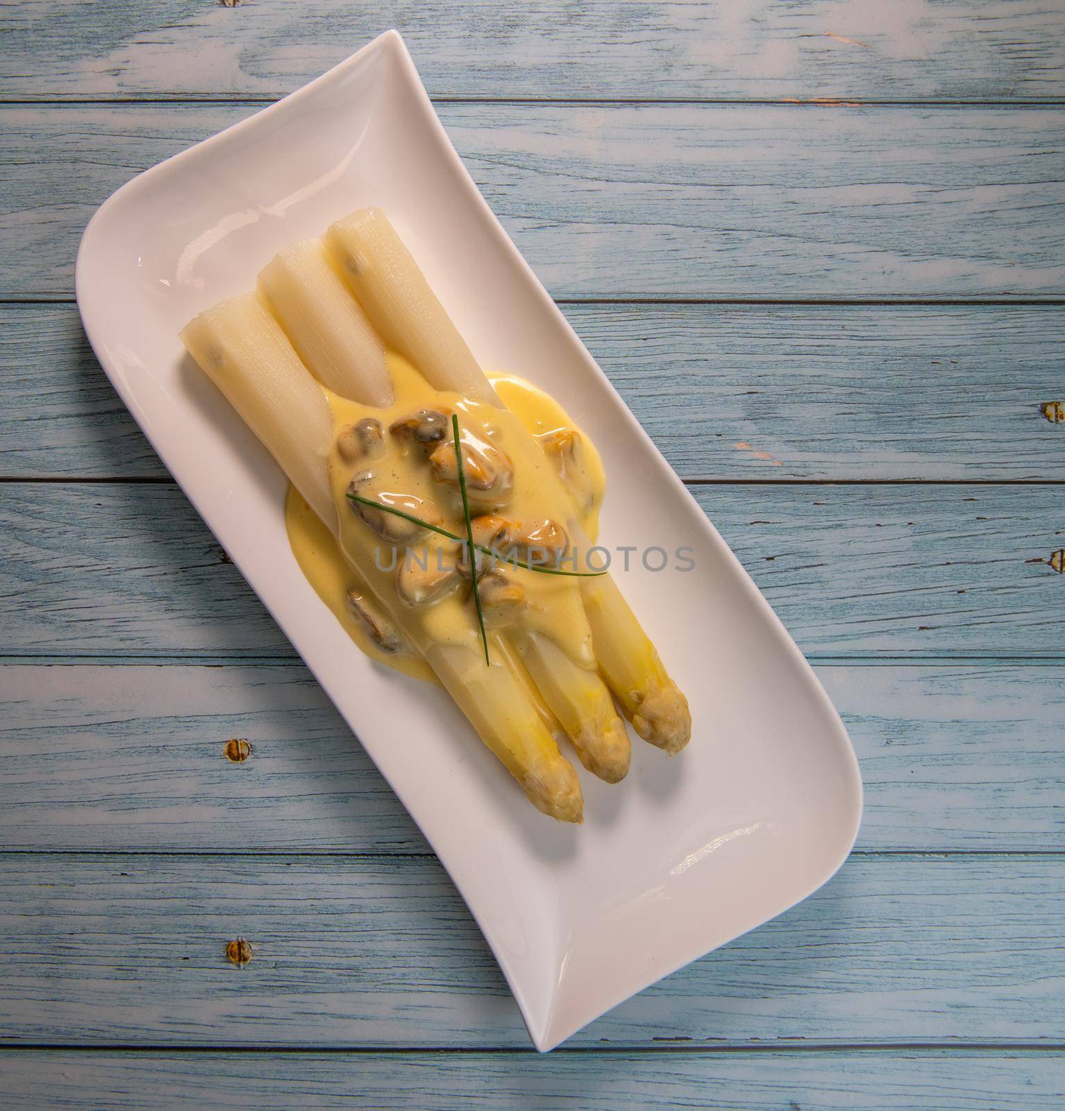 Large white asparagus and shell mousseline recipe. High quality photo