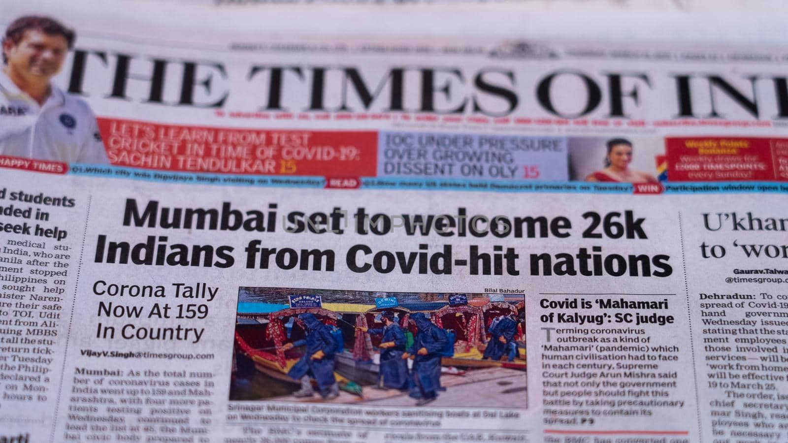 Dehradun, Uttarakhand India June 28, 2021. Coronavirus COVID-19 News Headline in Newspaper of India. Headlines of the month March, April 2020. High-quality apple prores 422 4k footage 60p.