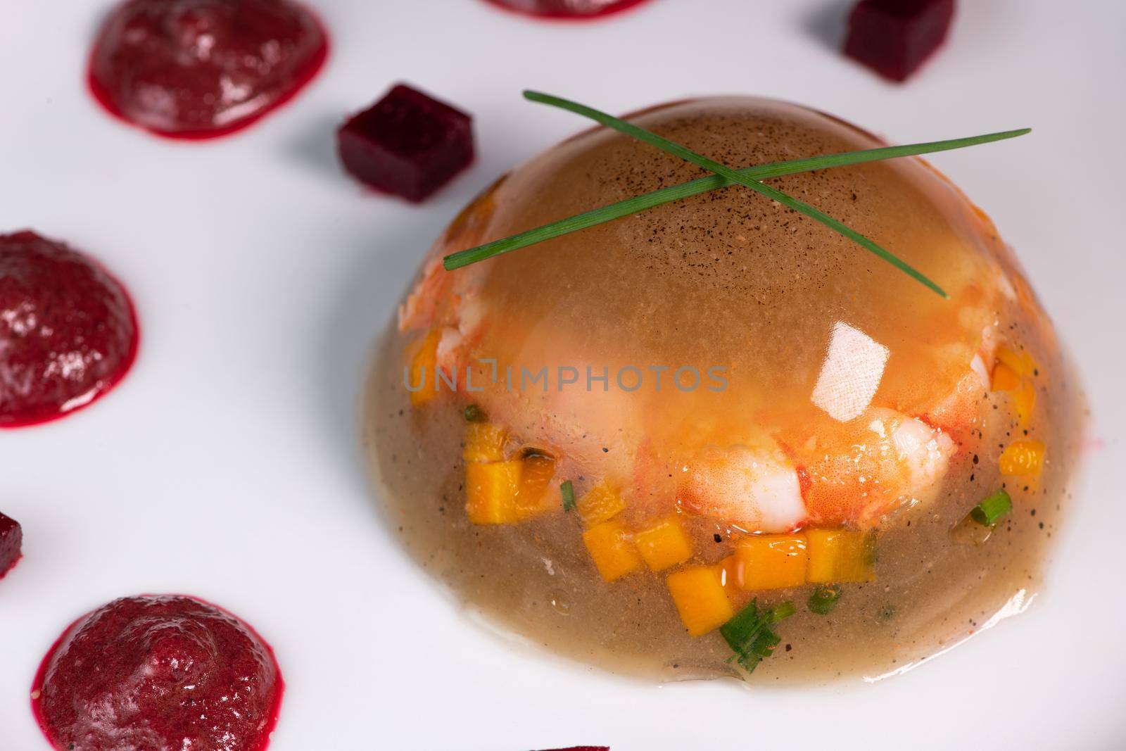 Aspic recipe, jelly made from a broth of prawns and peppery beetroot. High quality photo