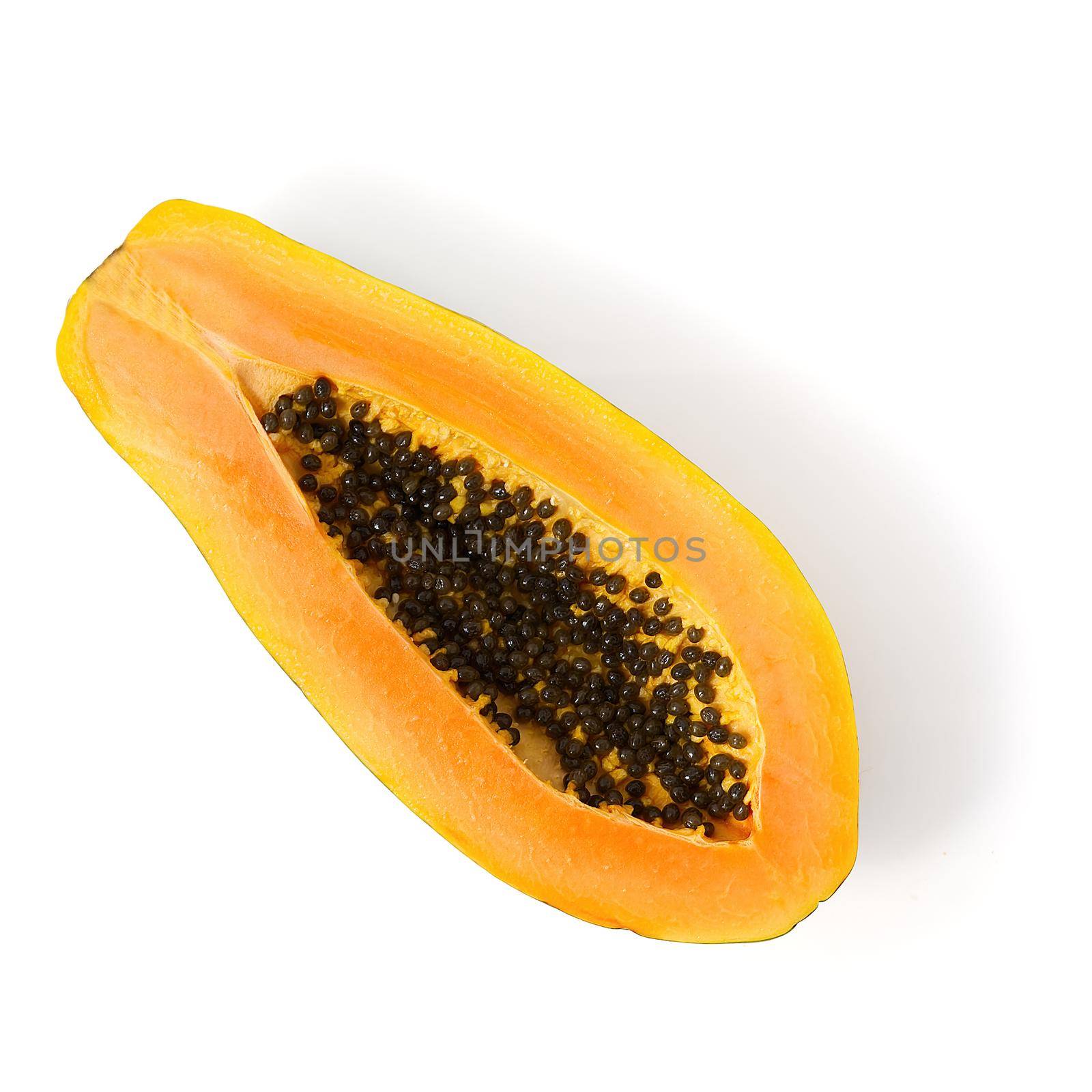 Papaya isolate on white. delicious ripe papaya cut in half close-up.