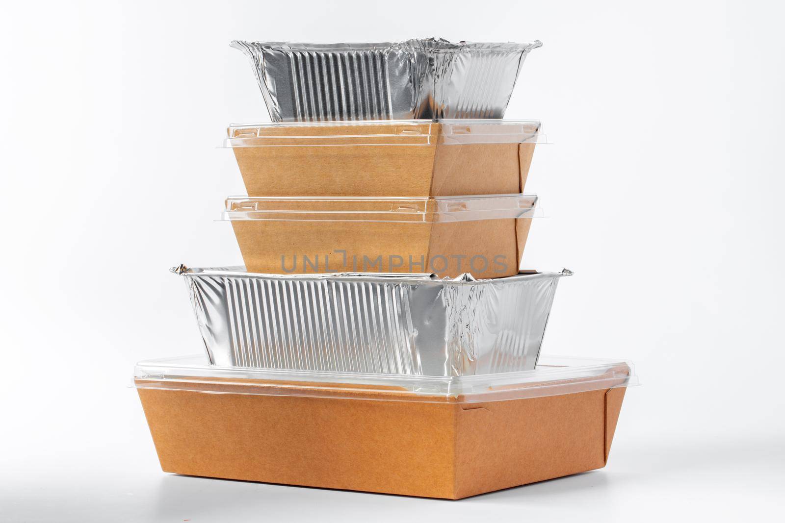 Assortment of food delivery containers on white background close up