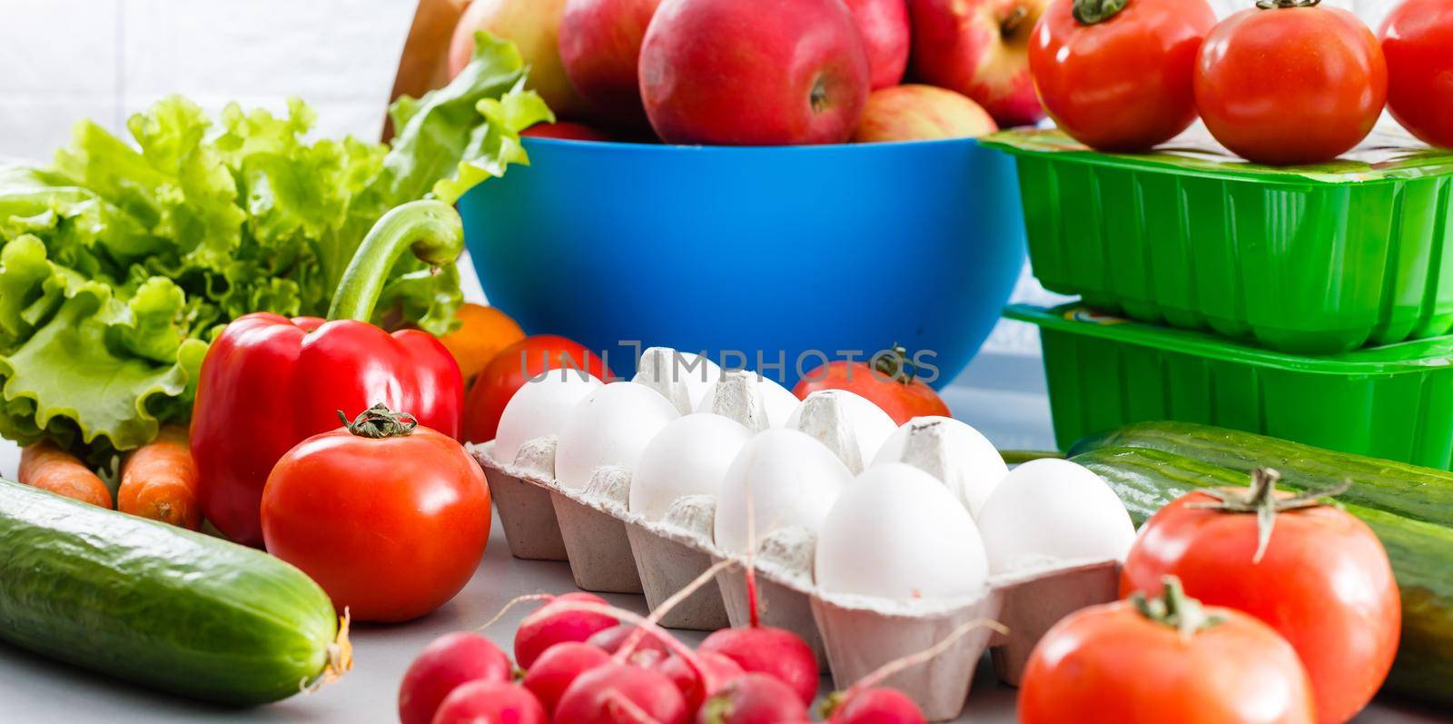 healthy food background, vegetables, fruits, eggs and dairy products on white table, top view