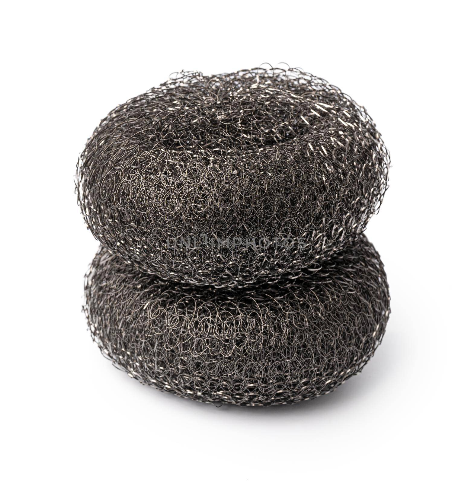 Metal sponge for washing dishes on a white background, close up