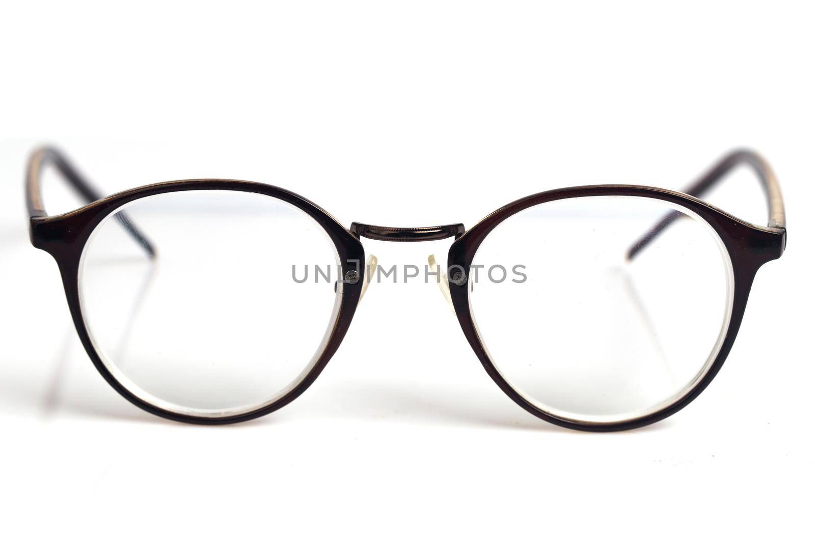 Closeup of black horned rim glasses Qinessential nerd gear