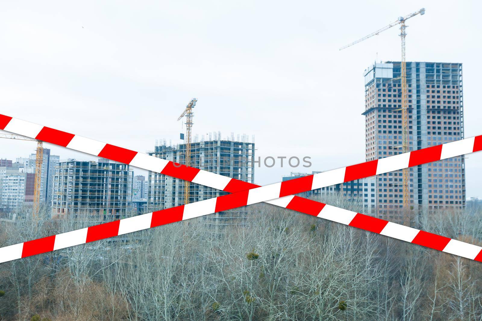 red and white safety tape at the construction site