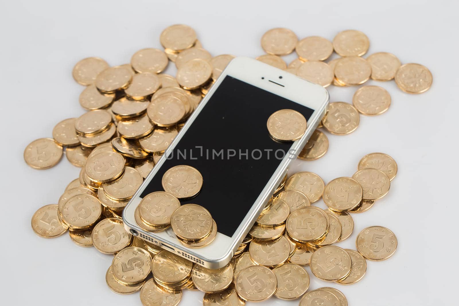 many coins on a white background for finance-about content
