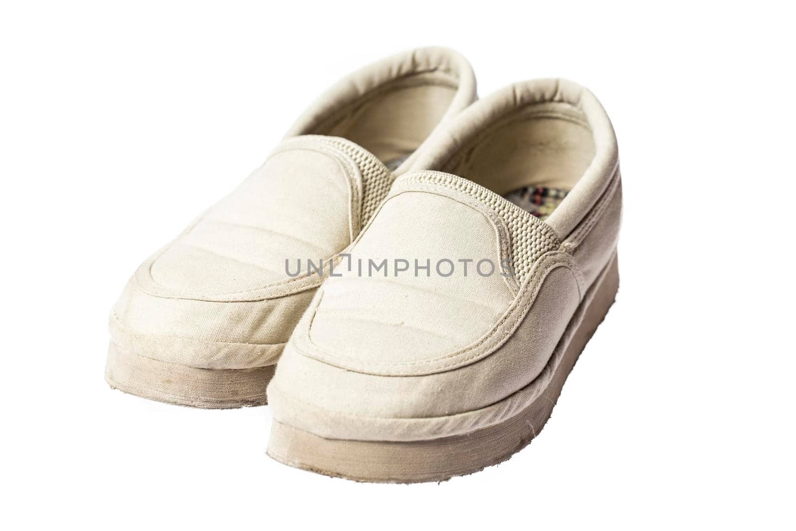 Pair of female summer shoe on white background