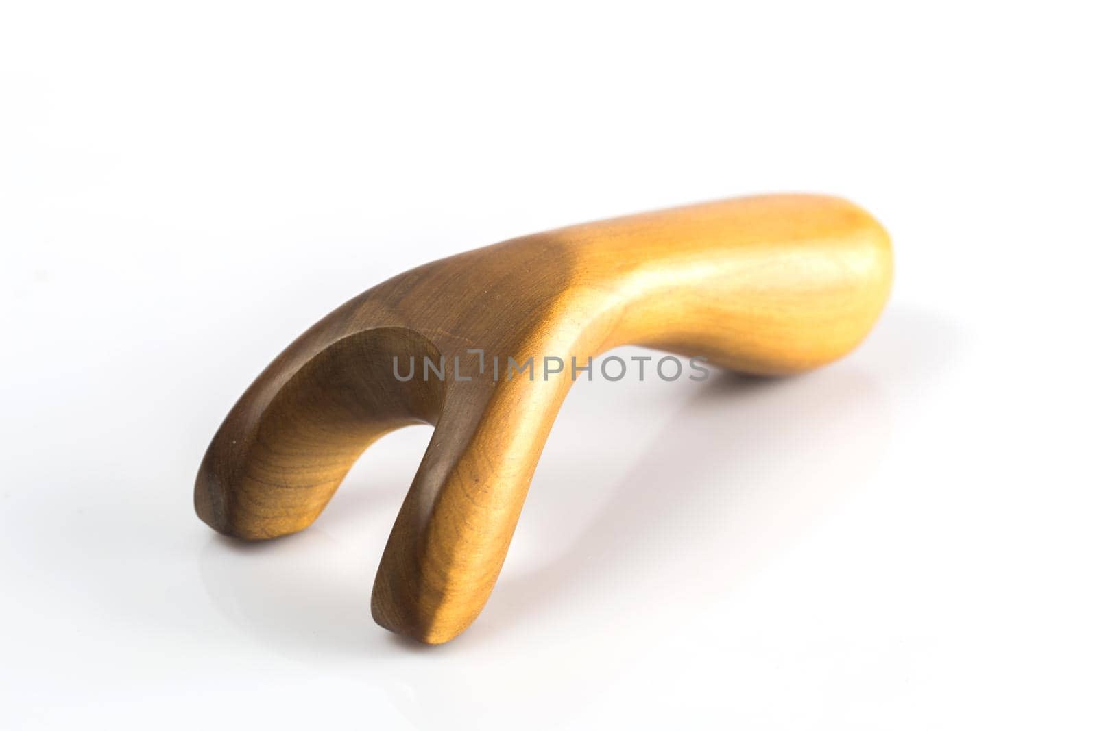 Wood object for corporal massage isolated on white