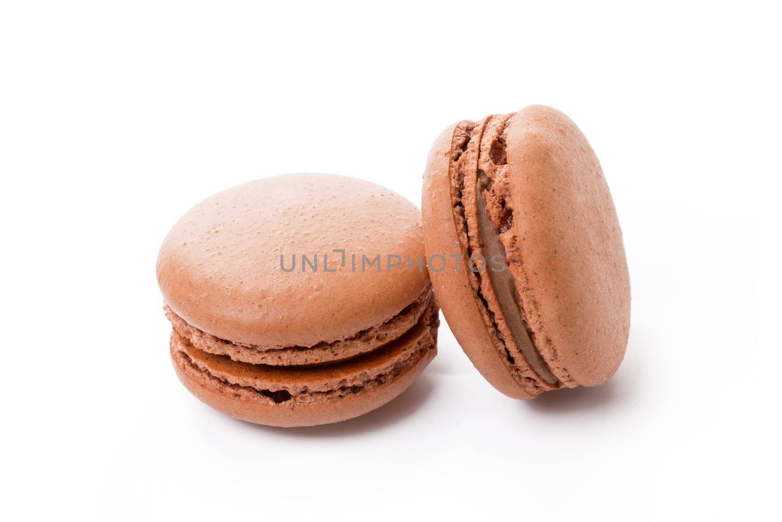 French colored macaroon cookie isolated on white background