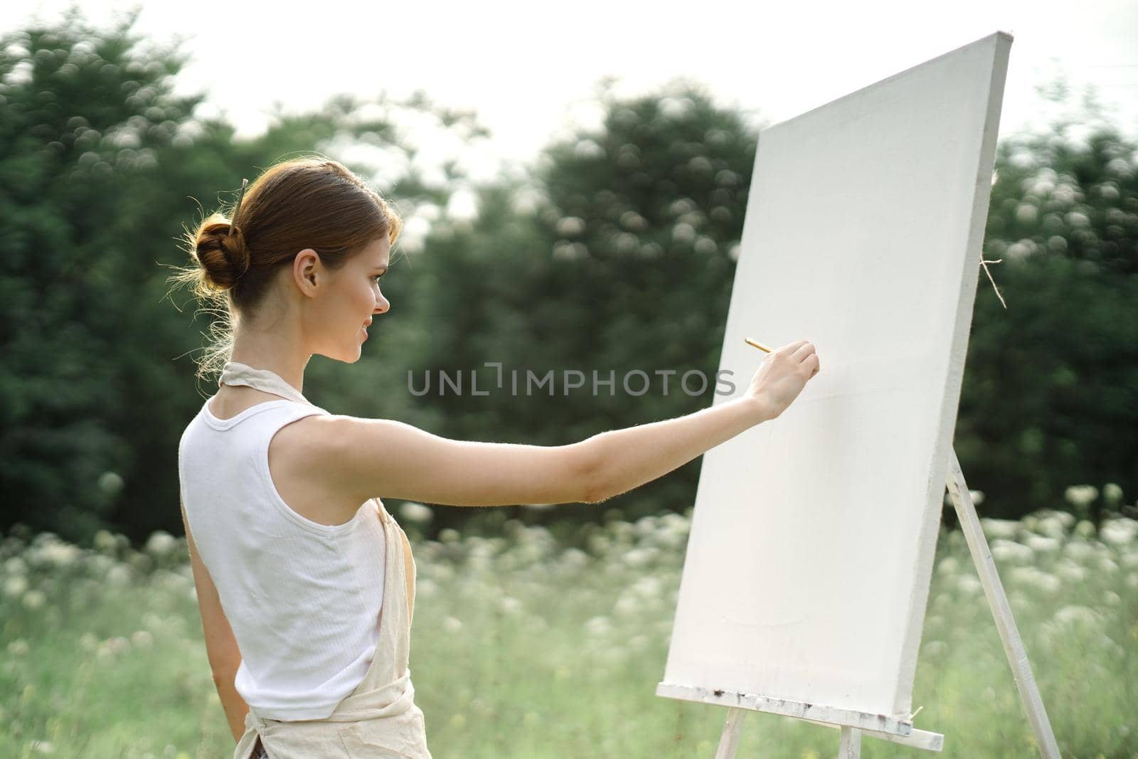 woman artist creative drawing landscape nature hobby. High quality photo