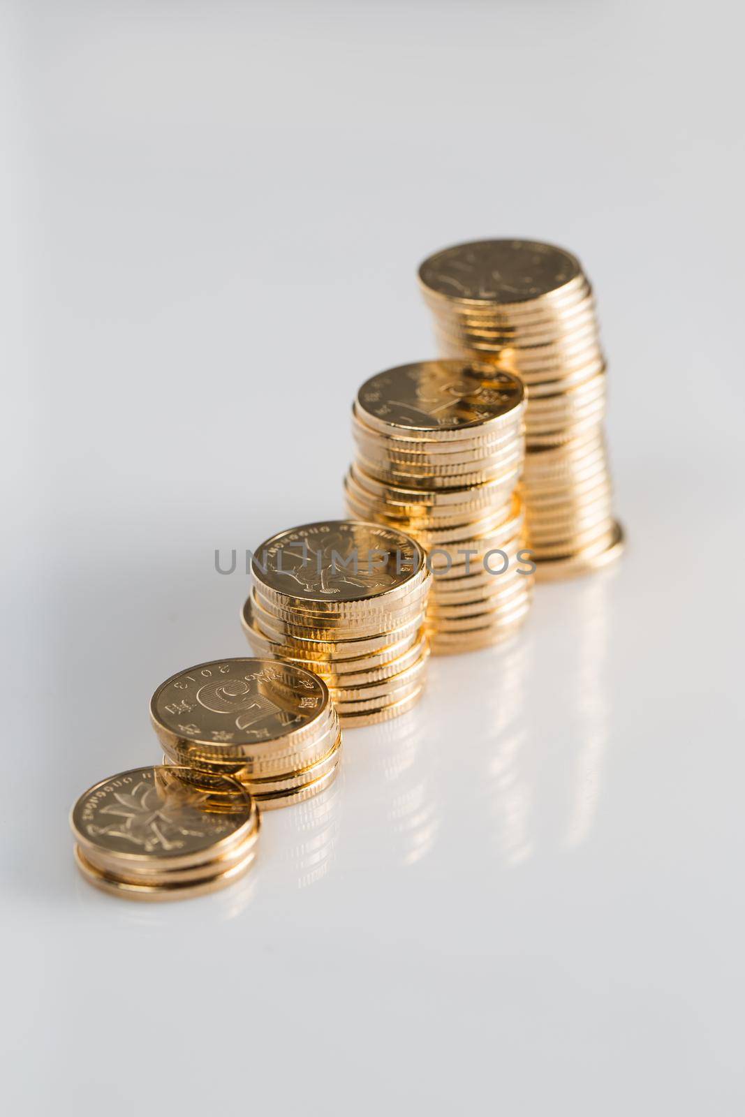 many coins on a white background for finance-about content
