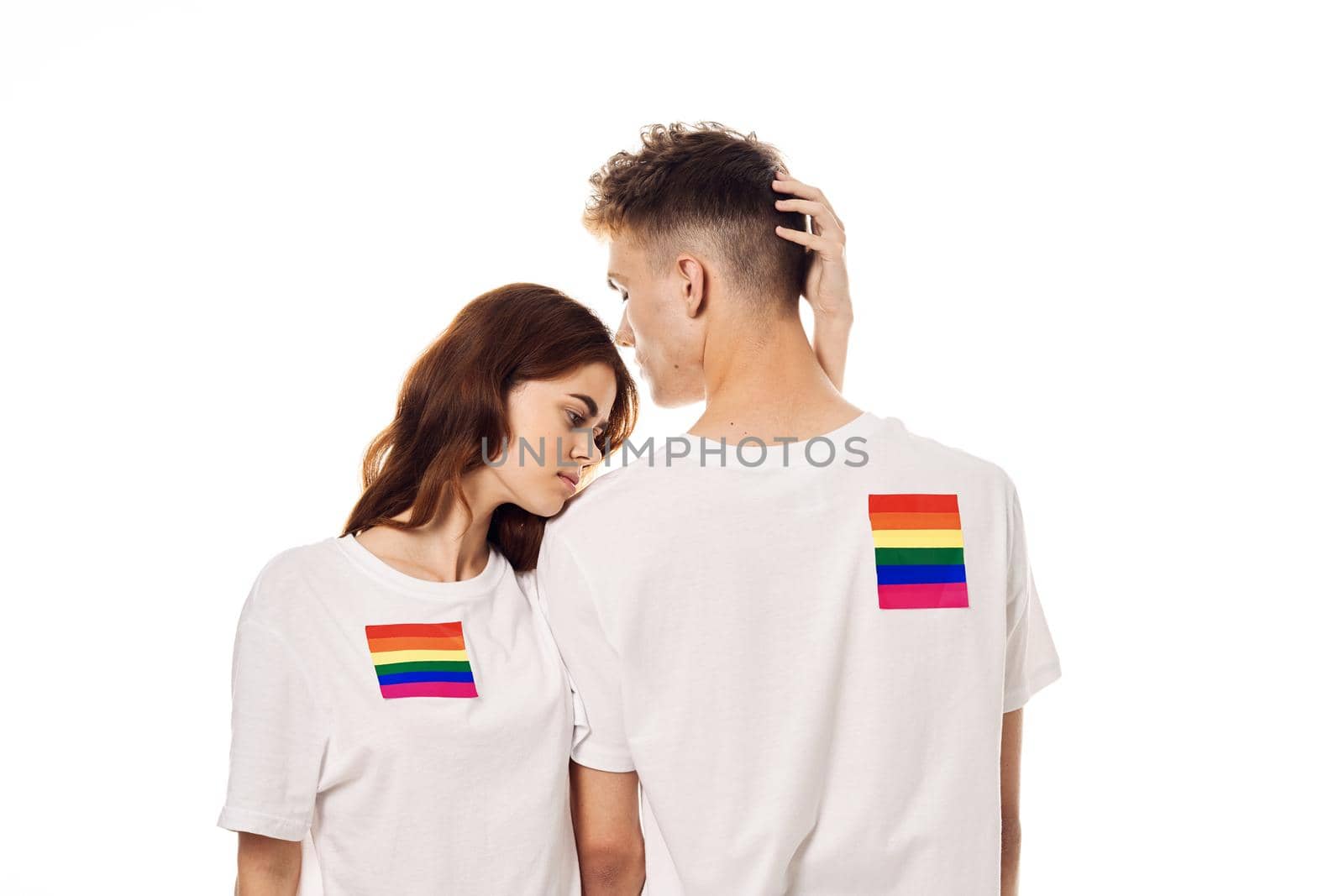 couple in white t-shirts Flag lgbt transgender sexual minorities by Vichizh