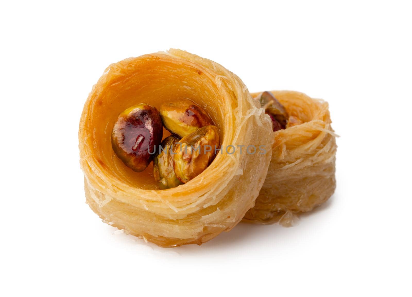 Close up photo of Turkish dessert baklava isolated on white