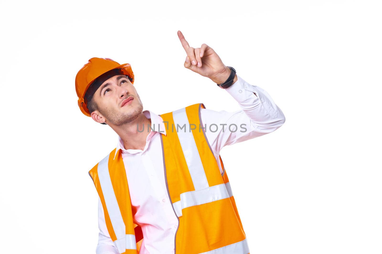 man in orange hard hat engineer work professionals construction. High quality photo