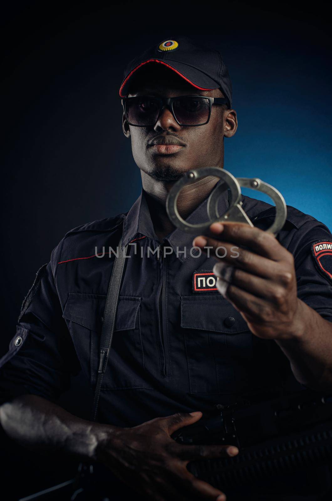 black guy in force police. english translation Police, Russia by Rotozey