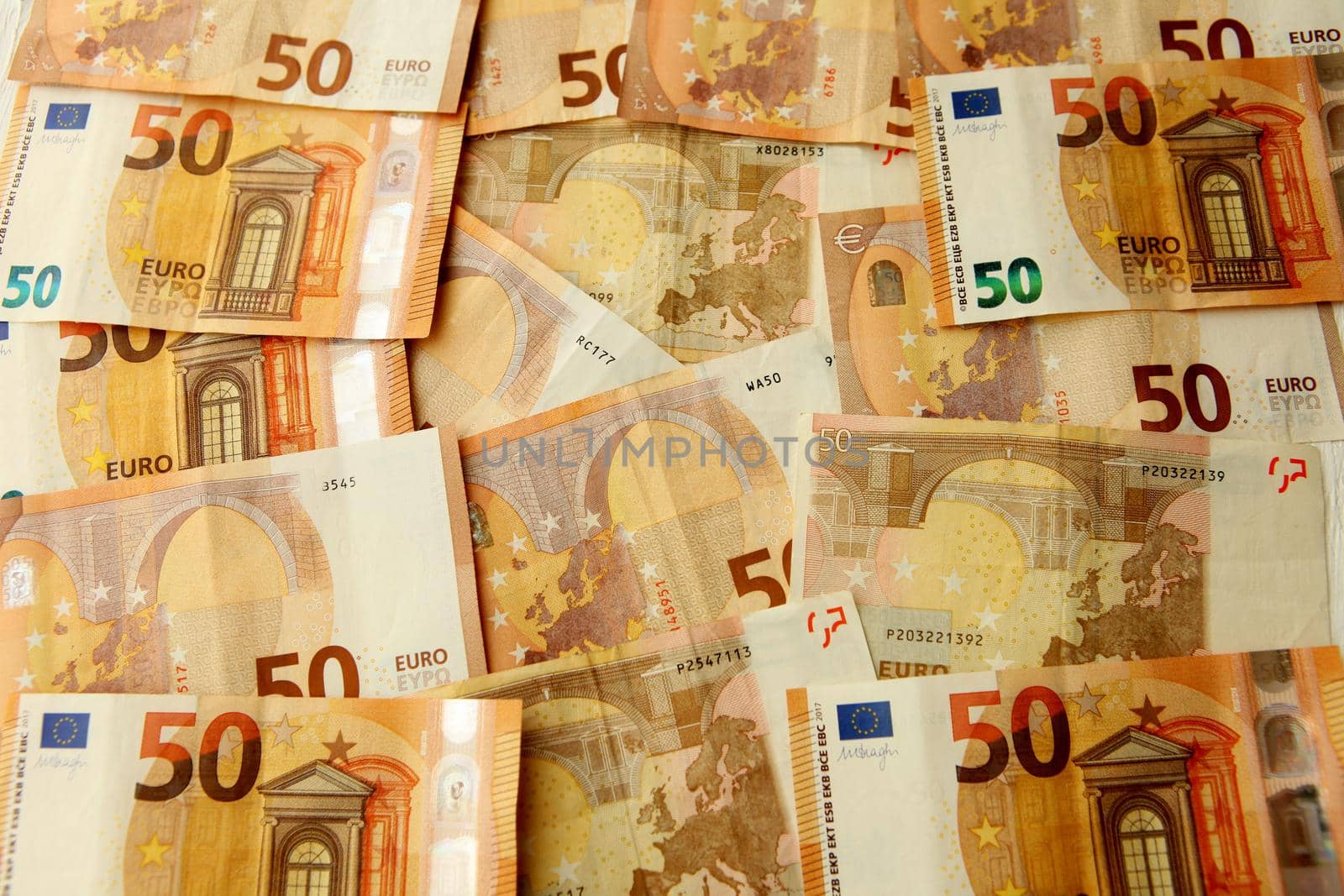 Lot of money. 50 euro banknotes flat lay. European Union Currency. euro money 50 euro banknotes close up.