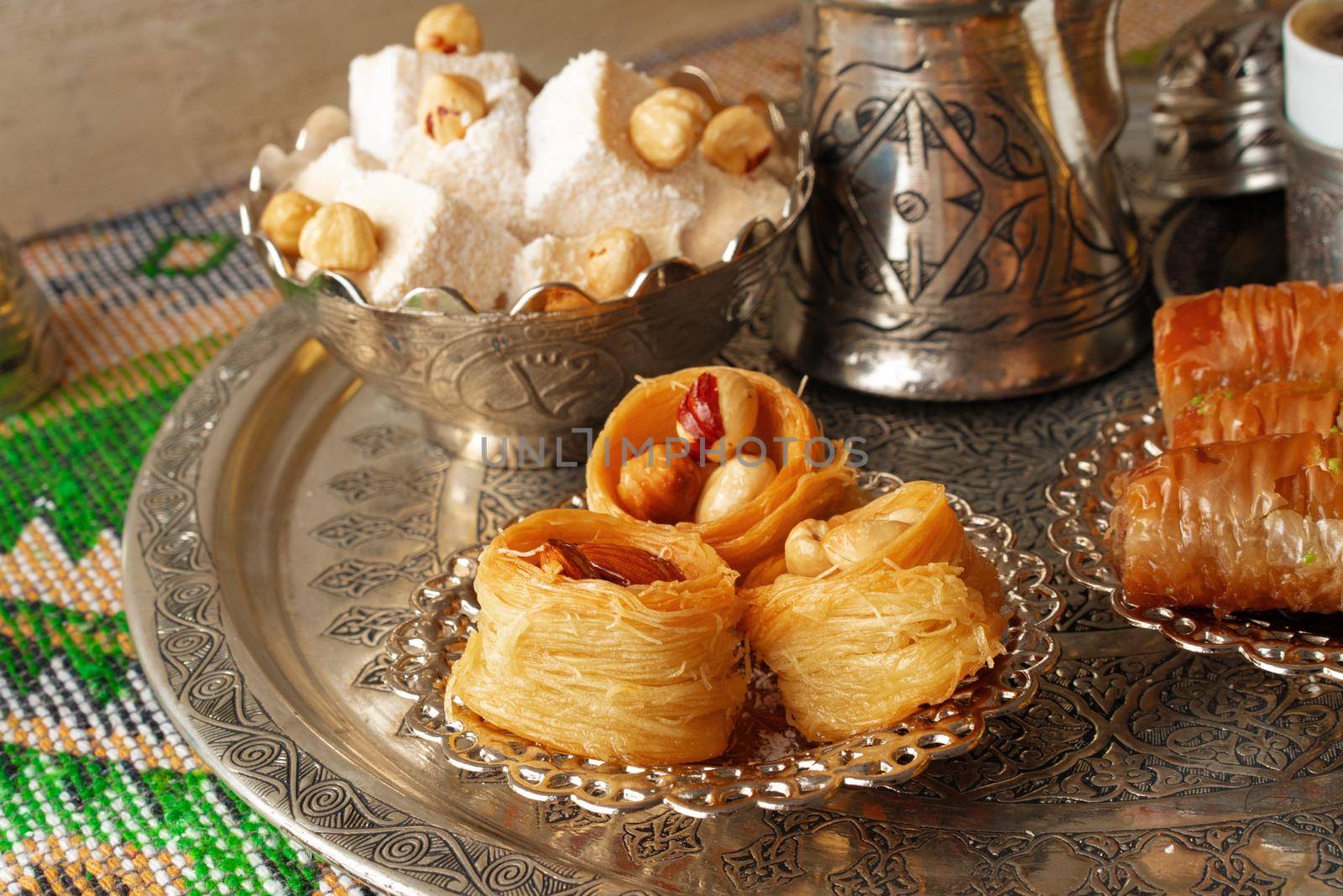 Traditional arabic dessert baklava with a cup of turkish coffee, close up