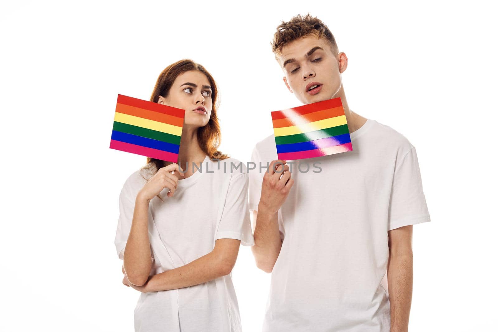 young couple lgbt Flag transgender lifestyle light background. High quality photo