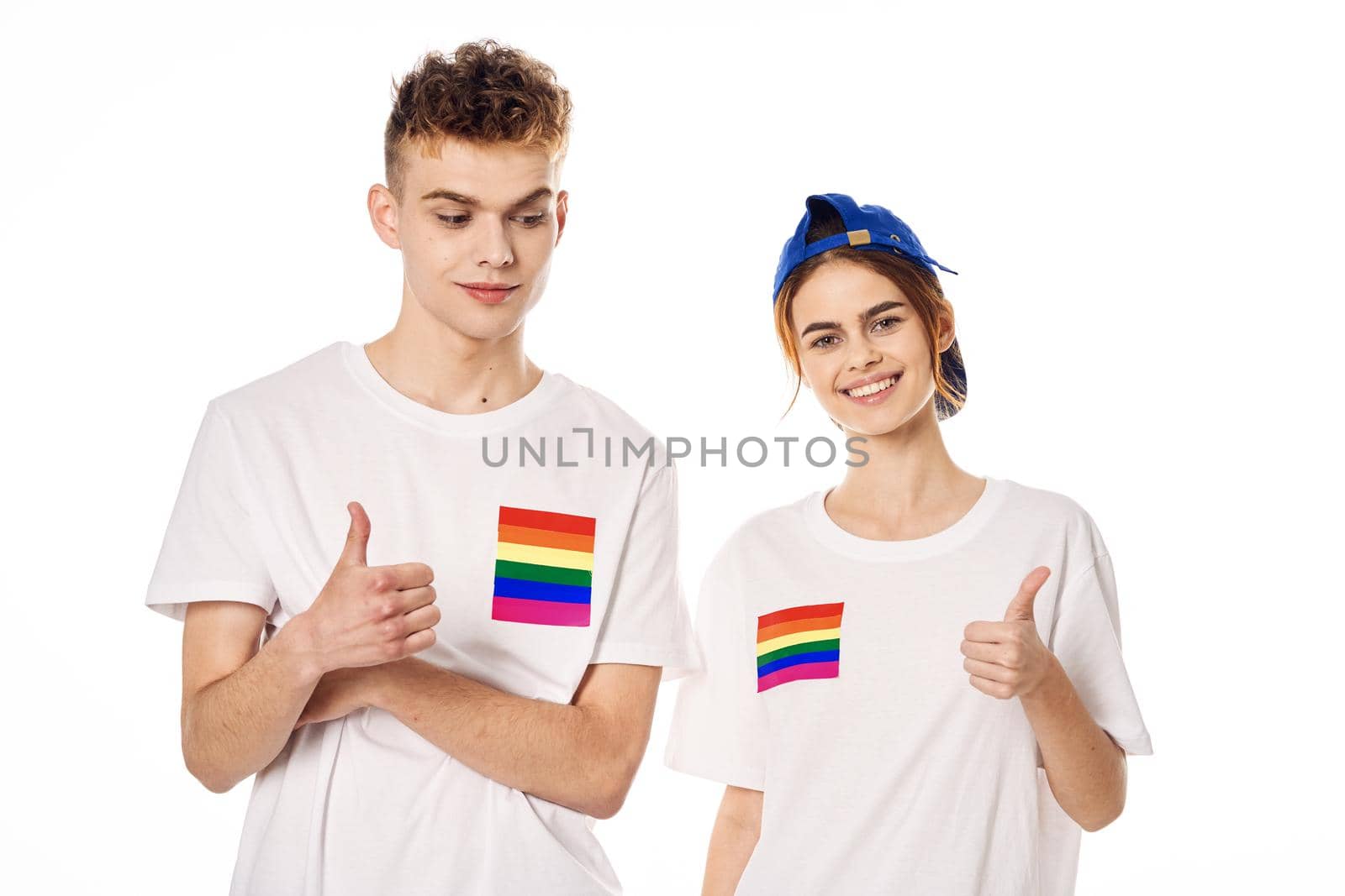 young couple in white t-shirts Flag lgbt transgender sexual minorities. High quality photo