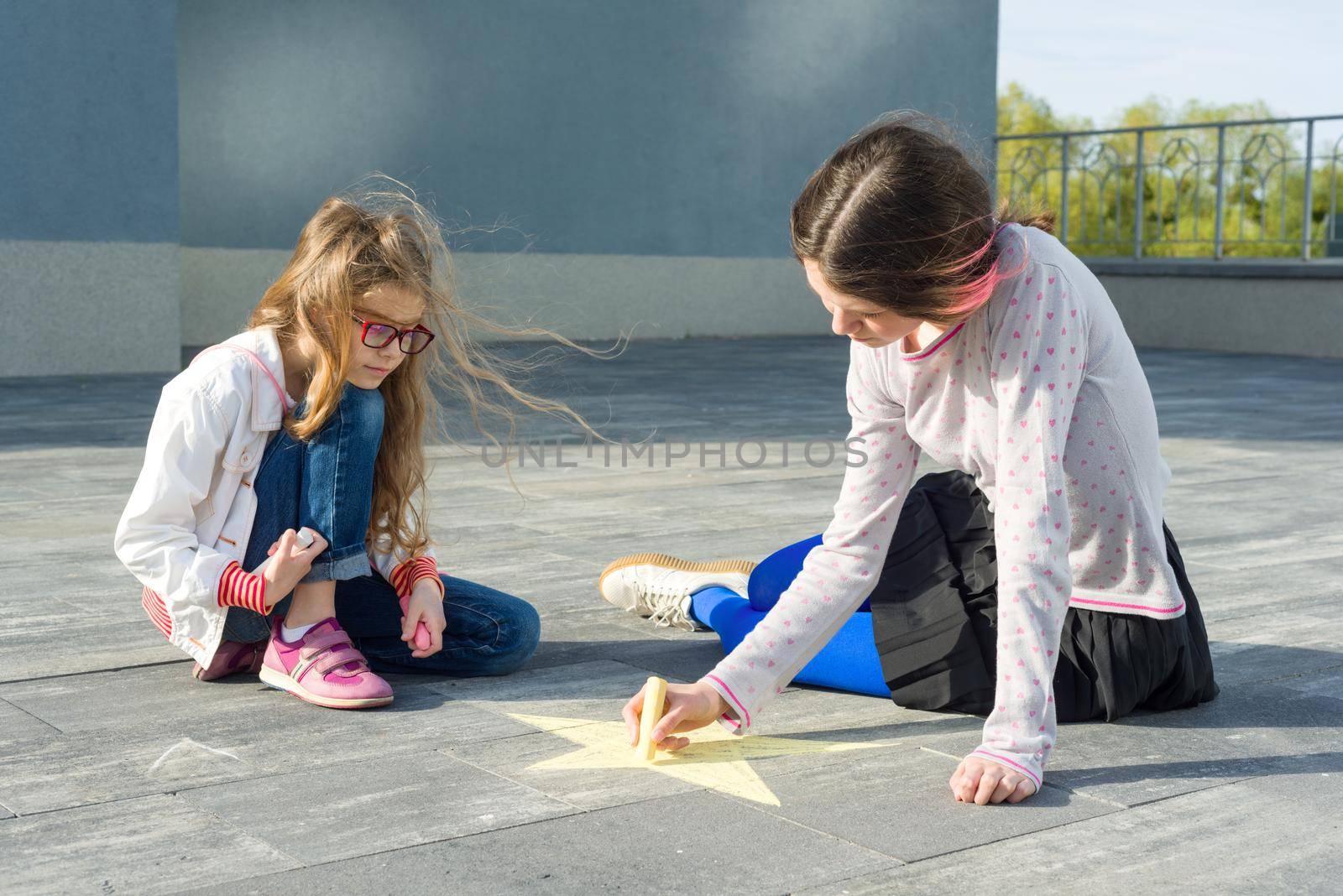 Children, girls draw star. by VH-studio