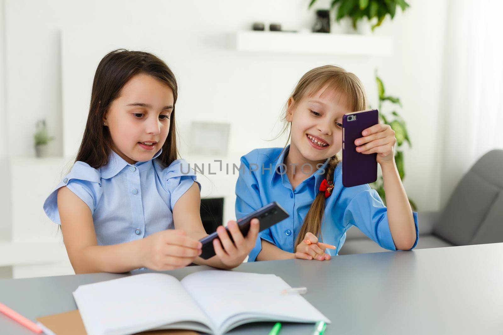 two little girls studying online. Distance Learning Online, e-learning, concept