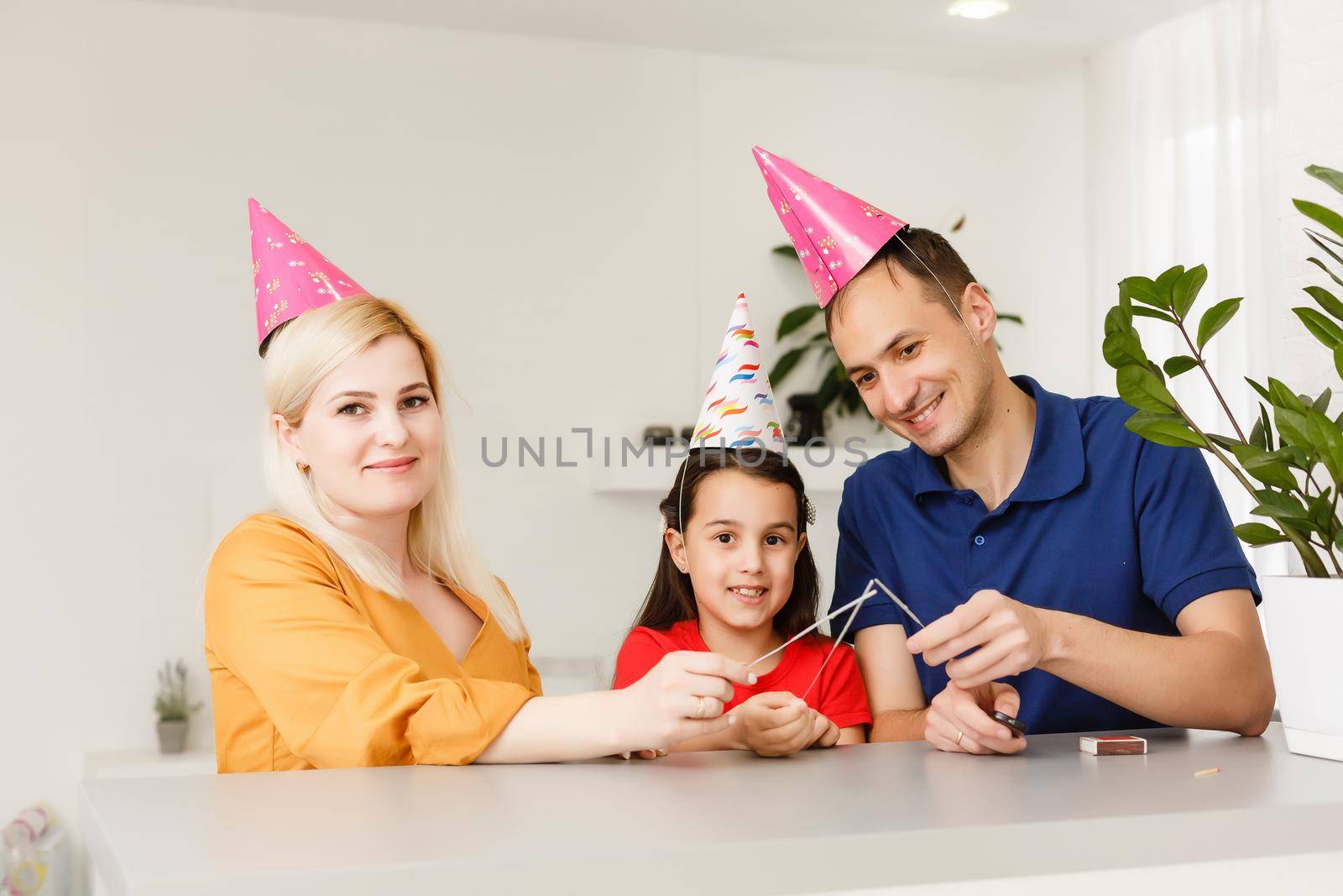 Happy family celebrating birthday via internet in quarantine time, self-isolation and family values, online birthday party