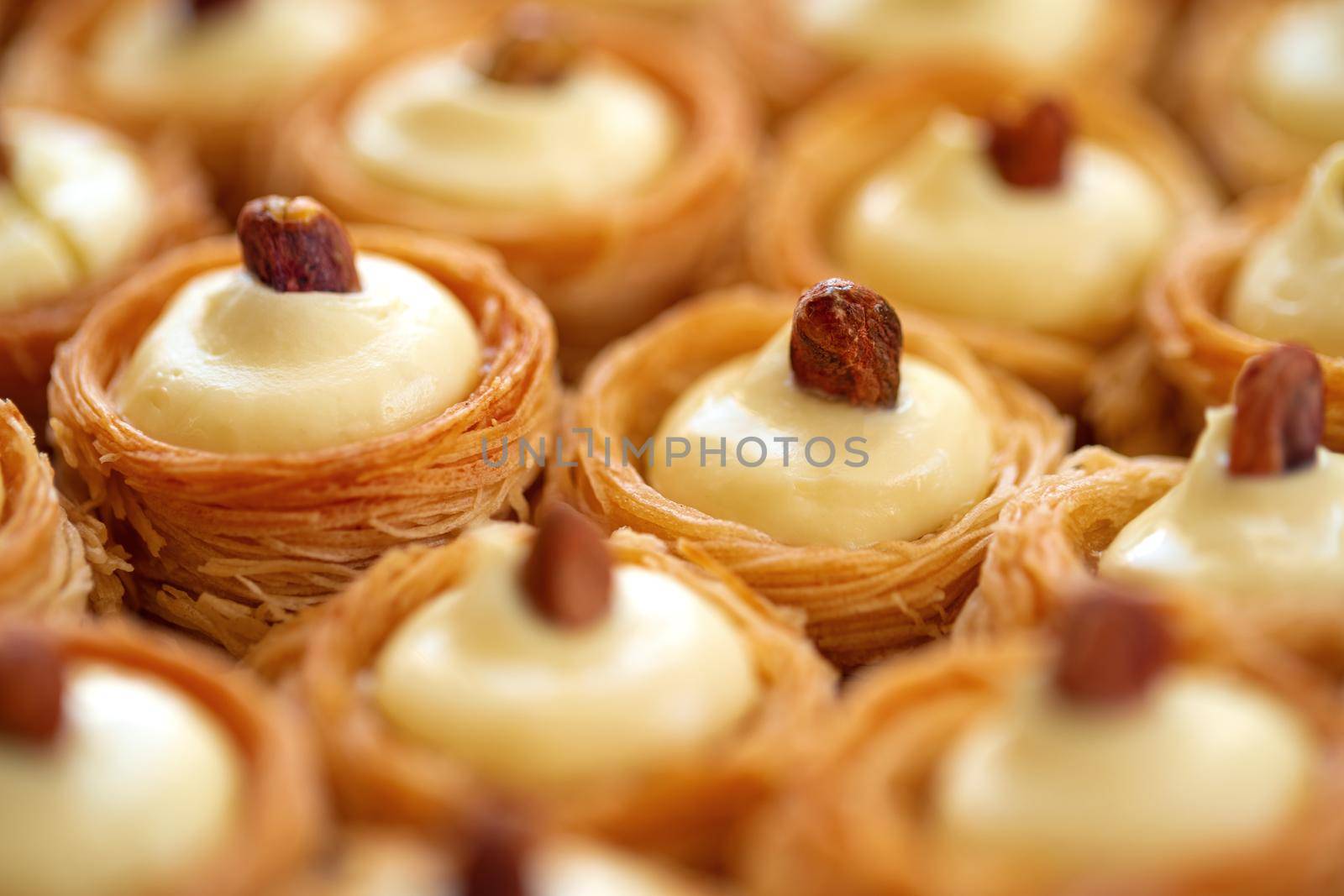 Turkish baklava dessert with honey, close up photo