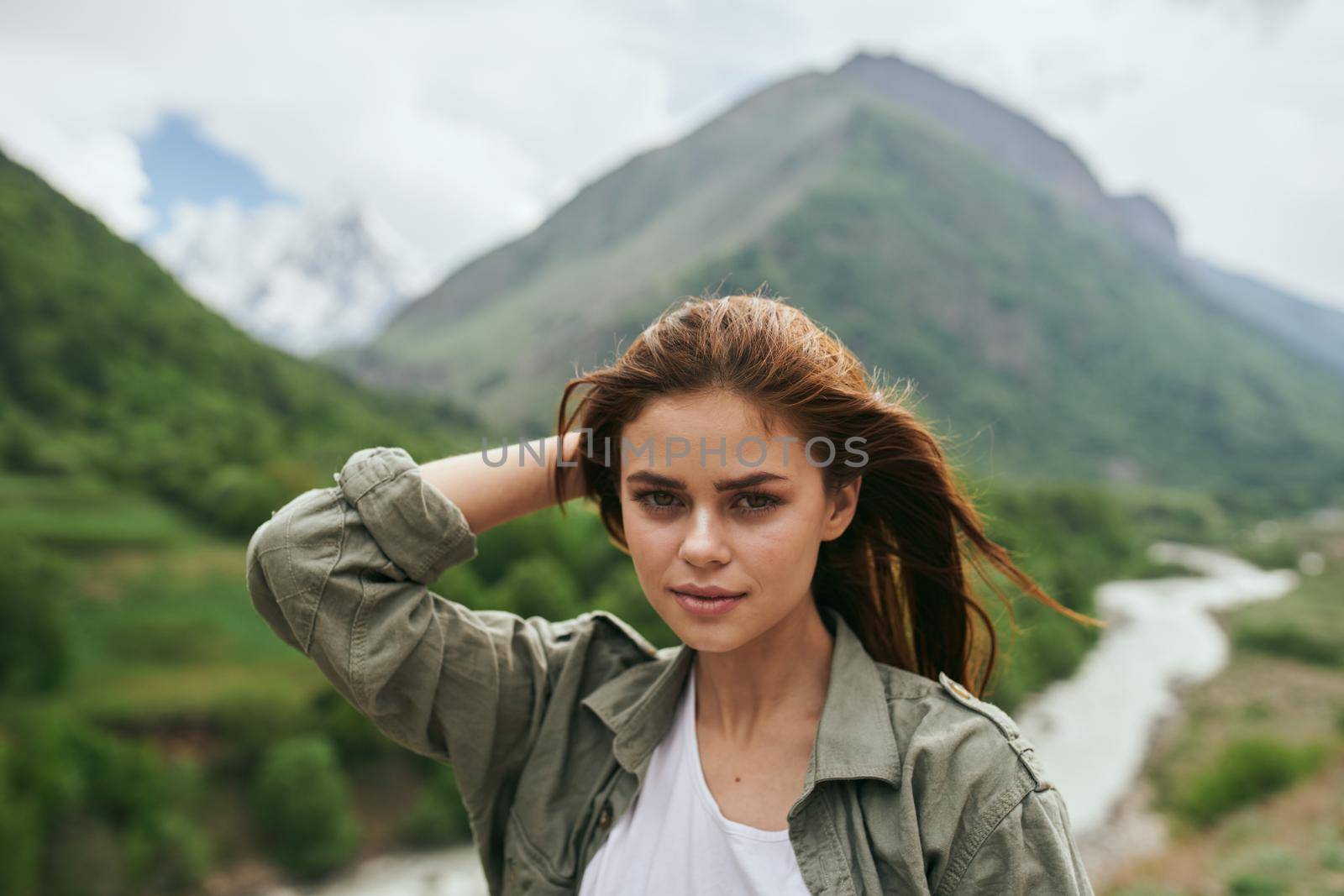 woman hiker mountains landscape travel freedom fresh air by Vichizh