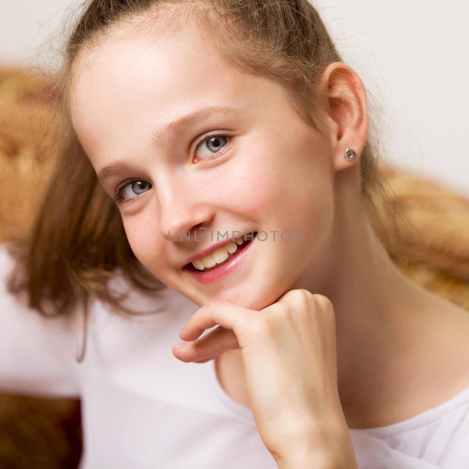 Portrait of a little girl close-up. Isolated on white background. by kolesnikov_studio