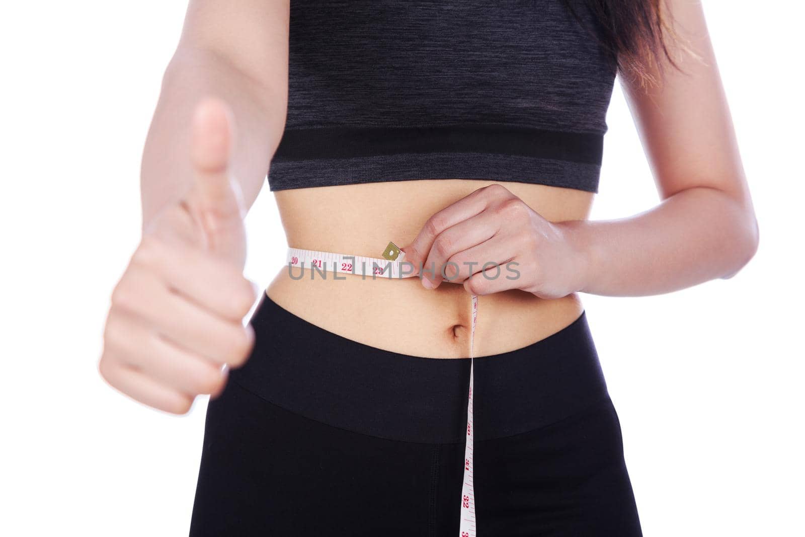 close up woman with measuring tape and showing thumb up sign isolated on a white background (diet concept)